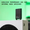A black WD_BLACK storage expansion card is placed on top of a white Xbox console, with a green background. Produktbild-Vorschau