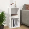 A white storage cube shelf with books and decorative items on top, next to a sofa. Voir les images du produit