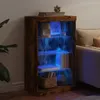 A dimly lit room with a wooden sideboard featuring blue LED lighting. Produktbild-Vorschau
