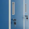 Close-up of two blue metal lockers with silver handles and keys. Anteprima dell’immagine prodotto