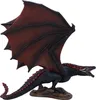 A figurine of a dragon with dark blue and red coloring, posed on a rock. Anteprima dell’immagine prodotto