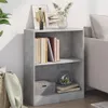 A bookshelf with books and decorative items in a room setting. Voir les images du produit