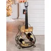 A guitar-shaped wine rack is displayed in a festive room with a Christmas tree and fireplace. Produktbild-Vorschau