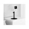 A white projector is mounted on a black stand, placed on a white nightstand. Anteprima dell’immagine prodotto