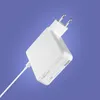 A white power adapter with a white cable is shown against a light purple background. Podgląd zdjęcia produktu