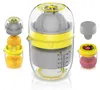 A multi-part product image showcasing a juicer with various attachments and components, including whole fruits and berries. Produktbild-Vorschau
