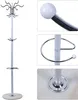 A white coat rack with multiple hooks and a circular base, shown with close-up details of its components. Náhled obrázku produktu