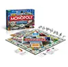 A Monopoly board game set, including the box and game pieces, displayed on a white background. Produktbild-Vorschau