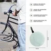 A person is holding a bicycle with a bell on the handlebars. To the right, there is a close-up of a bicycle bell with dimensions indicated. Produktbild-Vorschau