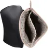 A black backpack is open, revealing its beige interior with a patterned lining. The backpack is shown from a slightly elevated angle, with the flap open to the side. Produktbild-Vorschau