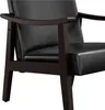 A close-up view of the armrest and seat of a black armchair with a dark brown wooden frame. Produktbild-Vorschau