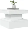 A white coffee table with a vase and books on top, set against a white background. Náhled obrázku produktu