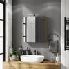 A modern bathroom vanity with a sink, mirror, and accessories. Produktbild-Vorschau