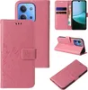 A collage of images showing a pink floral butterfly patterned flip phone case for a Xiaomi Redmi 15C, displayed from multiple angles and in use. Produktbild-Vorschau