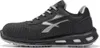 A side view of a black safety shoe against a white background. Voir les images du produit