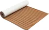 A rolled-up piece of brown foam flooring with black lines, likely for a boat or yacht, with the white backing visible. Podgląd zdjęcia produktu