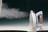 A steam iron is shown emitting a stream of steam against a dark background. Produktbild-Vorschau