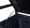 Close-up view of the interior of a storage bench, showing a gas strut mechanism. Voir les images du produit