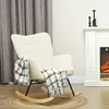 A beige rocking chair with a plaid blanket draped over it, placed in front of a fireplace and curtains. Anteprima dell’immagine prodotto