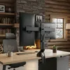 A home office setup with a fireplace and a window showing a winter scene. Podgląd zdjęcia produktu