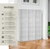 A white shelving unit with multiple compartments is shown, with marketing text and icons on the left side of the image. The shelving unit is standing on a wooden floor. Náhled obrázku produktu