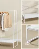 A white metal garment rack with clothes hanging on it, shown from multiple angles highlighting its features. Náhled obrázku produktu