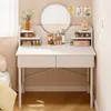 A white vanity desk with a round mirror, organized with makeup and accessories. Podgląd zdjęcia produktu