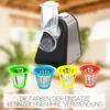 A kitchen appliance with multiple attachments, displayed with a blurred background. Anteprima dell’immagine prodotto