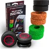 A product shot of gaming controller accessories, including thumbstick grips and aiming rings, along with their packaging. Podgląd zdjęcia produktu