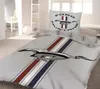A bedroom with a Ford Mustang themed duvet cover and pillow. Produktbild-Vorschau