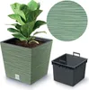 A green planter with a plant and a separate gray insert. Produktbild-Vorschau