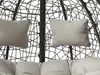 Close-up of cushions and the woven structure of a hanging chair. Náhled obrázku produktu