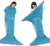 Two women are shown modeling a blue mermaid tail blanket. Anteprima dell’immagine prodotto