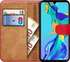 A book-style phone case with a Huawei P30 Lite inside, showing credit cards and euro banknotes. Anteprima dell’immagine prodotto