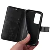 A hand holding a black flip phone case open, revealing the inside pockets and the phone holder. Produktbild-Vorschau