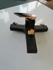 A black and gold bathtub faucet is displayed on a white surface. Produktbild-Vorschau