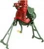 A cast iron corn sheller with a red hopper and green legs and body, set against a white background. Náhled obrázku produktu