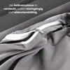 Close-up of a grey duvet cover showing a zipper detail. Náhľad obrázku produktu