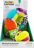 A plush musical inchworm toy is displayed in its retail packaging. Produktbild-Vorschau
