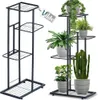 Two black metal plant stands are shown against a white background. One stand is empty and the other is filled with plants in pots. Náhled obrázku produktu