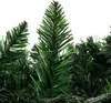 A close-up view of artificial pine branches, likely part of a Christmas garland or tree. Náhled obrázku produktu