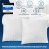 Two white pillows are shown on a bed with a blue gradient background. Several icons and text describing product features are overlaid on the image. Produktbild-Vorschau