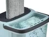 Close-up of a mop head being dipped into a compartment of a mop bucket filled with water. Podgląd zdjęcia produktu