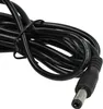 A close-up shot of a black power cable with a DC connector. Produktbild-Vorschau