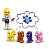 A LEGO Friends character holding a lipstick and a compact, with four poodle figures and a thought bubble with a paw print and question mark. Náhled obrázku produktu