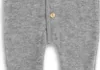 A close-up view of a grey baby overall with a wooden button. Produktbild-Vorschau