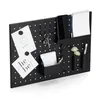A black pegboard organizer with various items attached, including notes, keys, a phone, a notebook, pens, and small decorative flowers. Náhled obrázku produktu