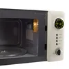 A close-up view of the interior and control panel of a cream-colored microwave. Podgląd zdjęcia produktu