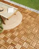 Outdoor patio setting with wooden tiles, a lounge chair, hat, and book. Náhled obrázku produktu