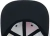 The underside of a black snapback cap with colorful Pokémon graphics visible. Anteprima dell’immagine prodotto
